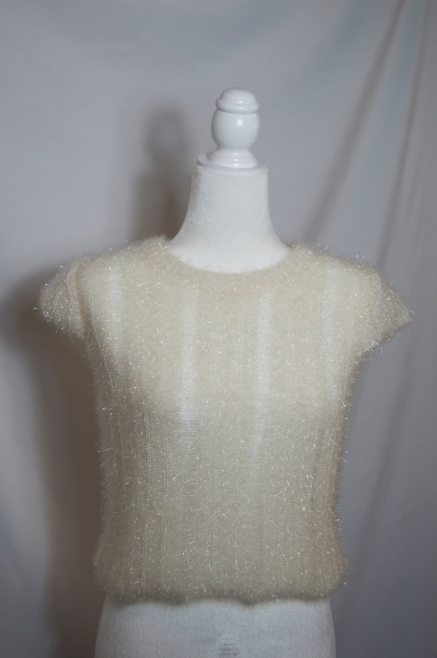 cream colored quarter sleeve subtle sparkly sweater top