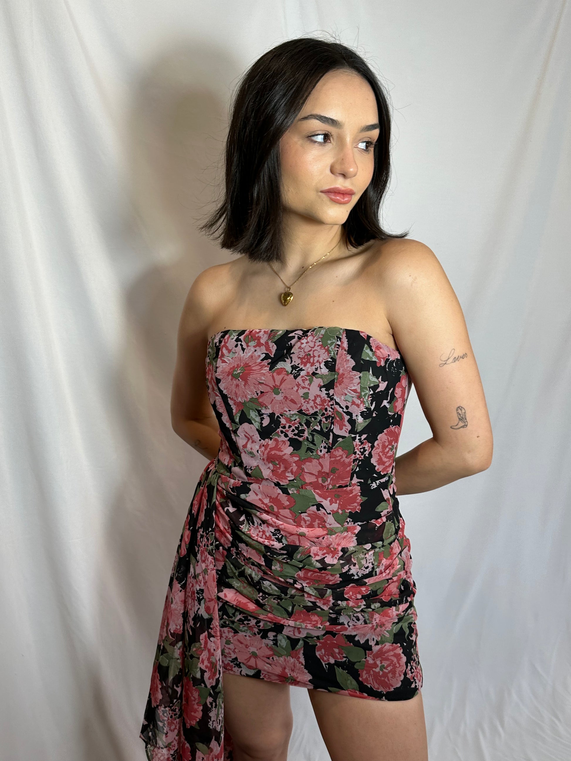 red pink and black floral mini dress with tie accent on side