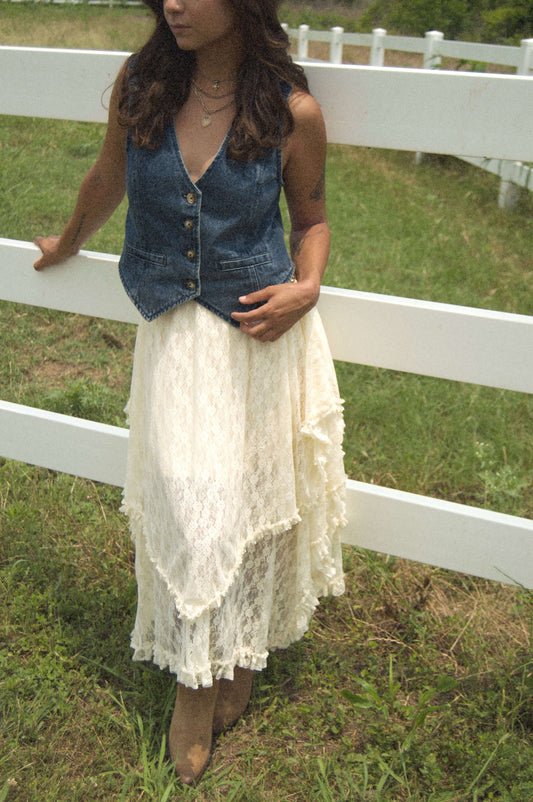 medium blue wash denim vest with neutral buttons