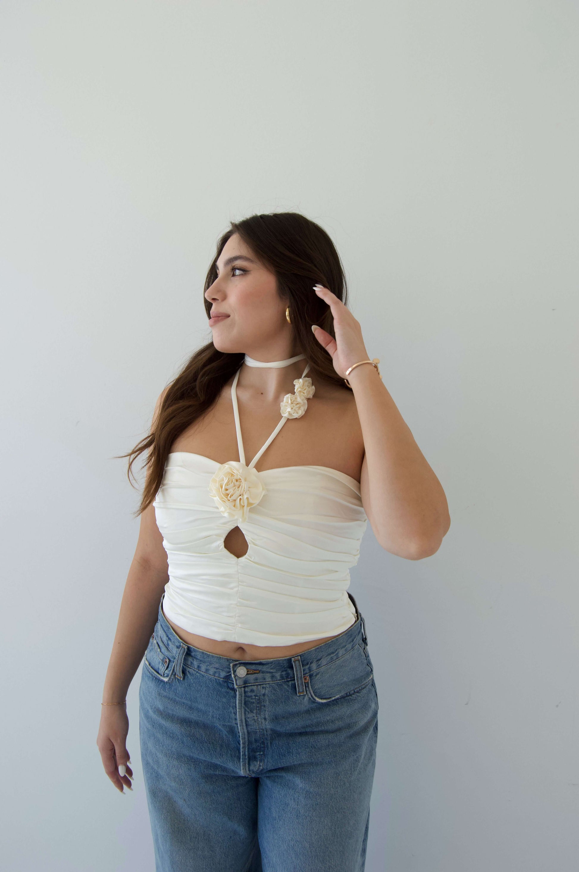 white shiny ruched strapless tube top with halter rosette ties around neck