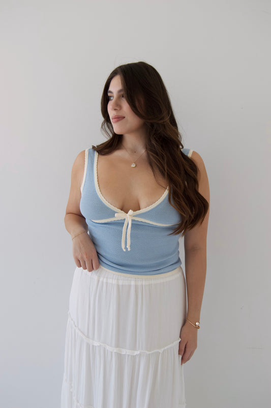blue tank top knit blouse with cream scalloped detailing and tie